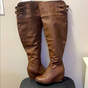 Over the knee wedge boots